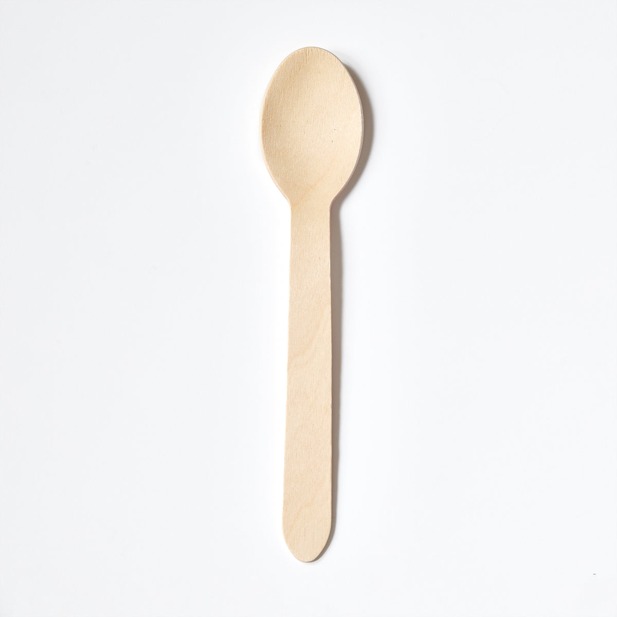 A single small wooden compostable & disposable spoon made of light natural birchwood, shown vertically against a plain white background.